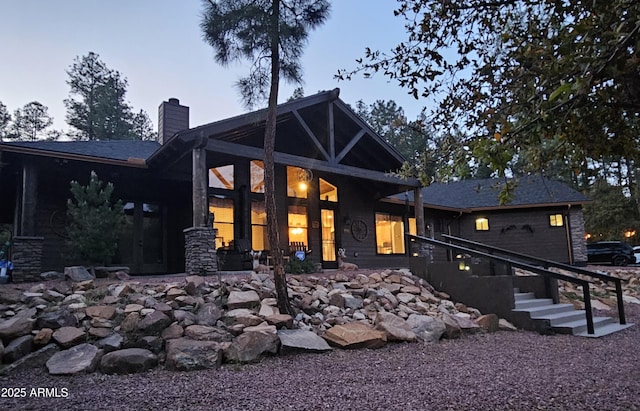 4990 N Pine Creek Canyon Dr, Pine, AZ 85544 - back of property with a chimney