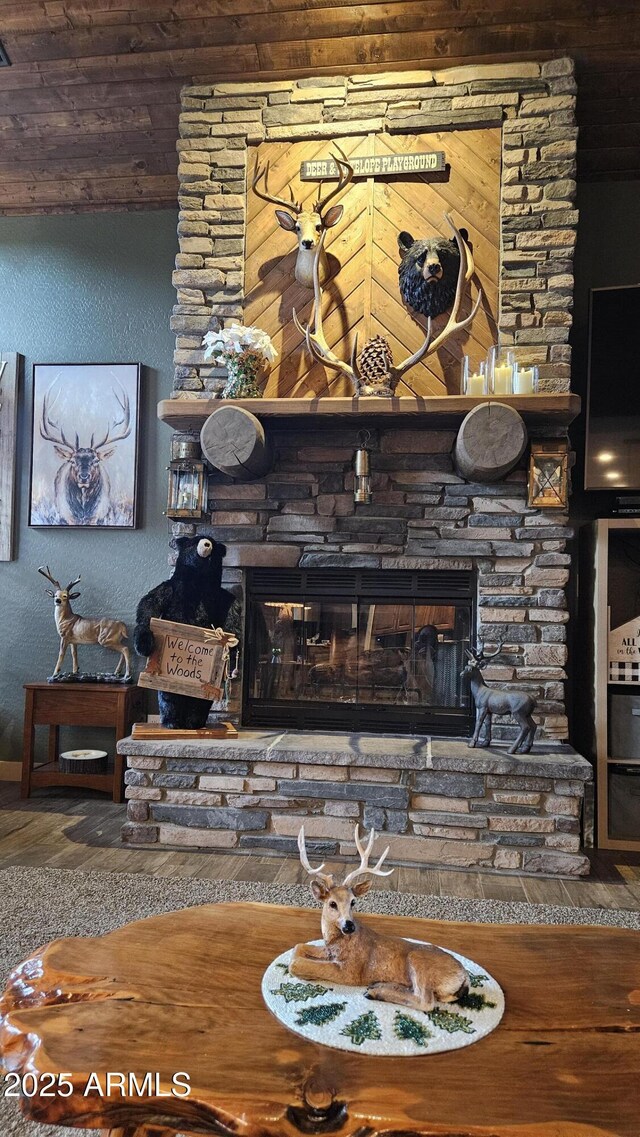 4990 N Pine Creek Canyon Dr, Pine, AZ 85544 - detailed view of wood finished floors, a fireplace, and wood ceiling