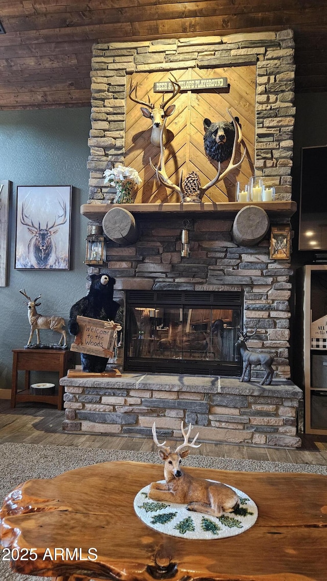 4990 N Pine Creek Canyon Dr, Pine, AZ 85544 - detailed view of wood finished floors, a fireplace, and wood ceiling