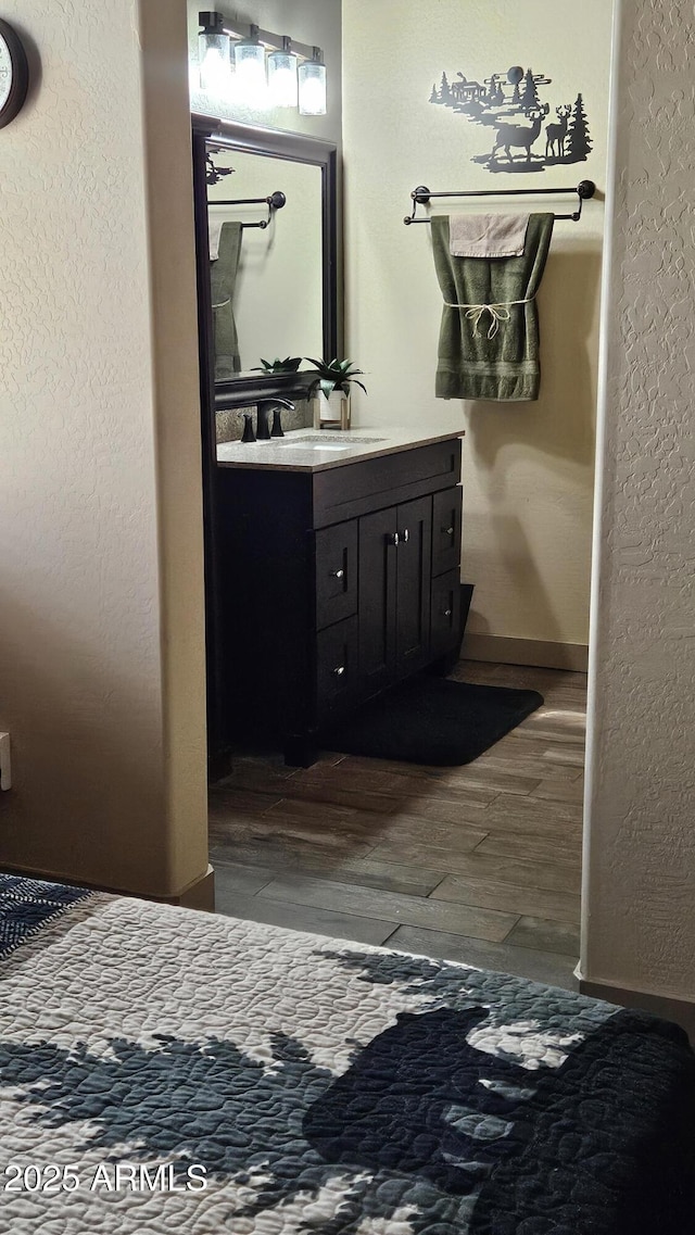 4990 N Pine Creek Canyon Dr, Pine, AZ 85544 - bathroom with wood finished floors and vanity