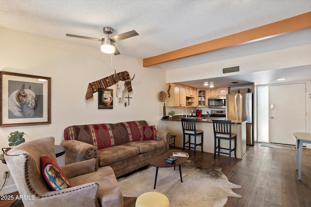 16819 E Gunsight Dr Unit A31, Fountain Hills, AZ 85268 - living room featuring a textured ceiling, dark wood finished floors, and ceiling fan