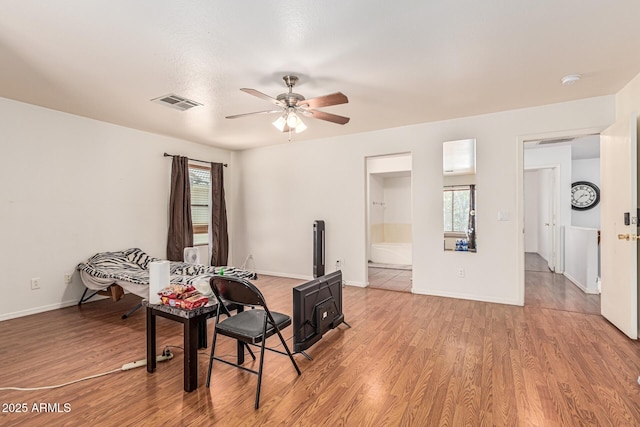 8939 W Villa Rita Dr, Peoria, AZ 85382 - office featuring ceiling fan, plenty of natural light, and light wood-type flooring