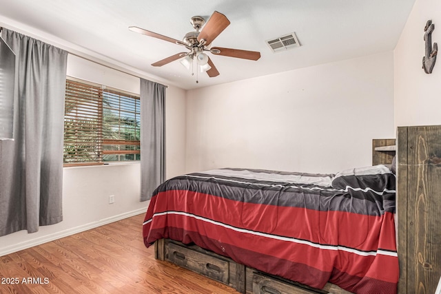 8939 W Villa Rita Dr, Peoria, AZ 85382 - bedroom featuring wood finished floors and a ceiling fan