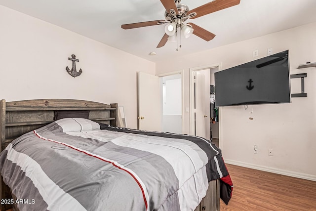 8939 W Villa Rita Dr, Peoria, AZ 85382 - bedroom with wood finished floors and a ceiling fan