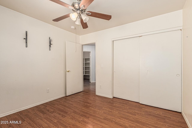 8939 W Villa Rita Dr, Peoria, AZ 85382 - unfurnished bedroom with wood finished floors, a closet, and a ceiling fan