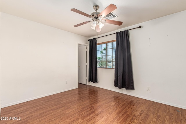 8939 W Villa Rita Dr, Peoria, AZ 85382 - spare room featuring a ceiling fan and wood finished floors