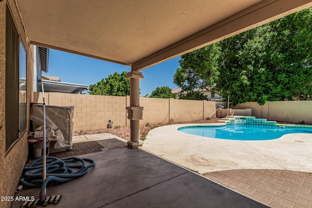 8939 W Villa Rita Dr, Peoria, AZ 85382 - view of swimming pool featuring a fenced backyard and a patio area
