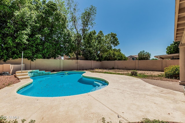 8939 W Villa Rita Dr, Peoria, AZ 85382 - view of swimming pool featuring a patio and a fenced backyard