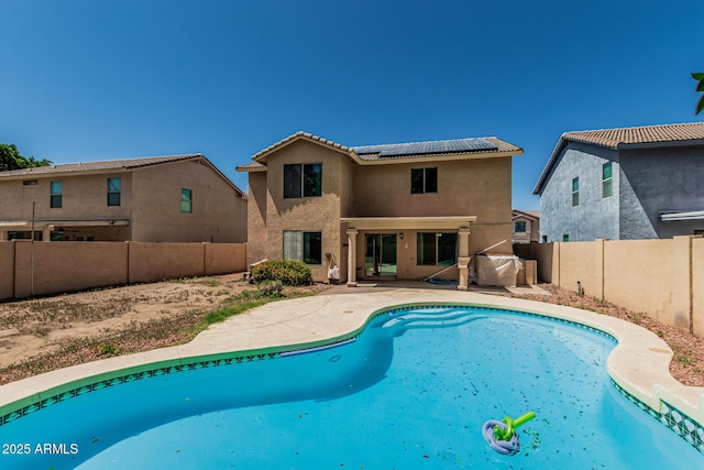 8939 W Villa Rita Dr, Peoria, AZ 85382 - view of pool featuring a fenced backyard and a patio area