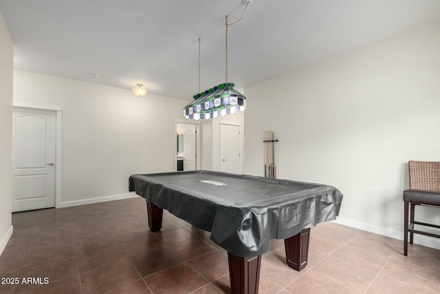 game room featuring billiards, dark tile patterned floors, and baseboards