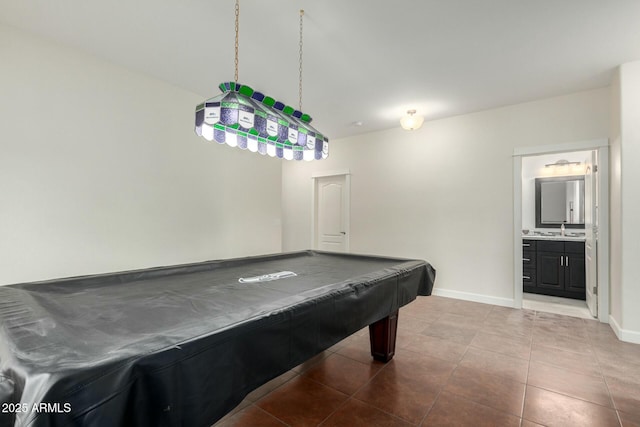 playroom featuring billiards, baseboards, a sink, and tile patterned floors