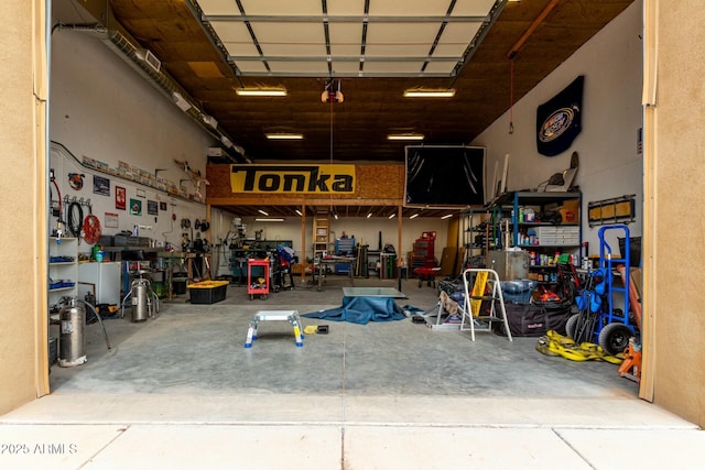 garage with a workshop area