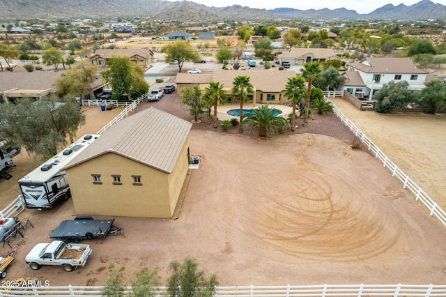 drone / aerial view with a residential view and a mountain view