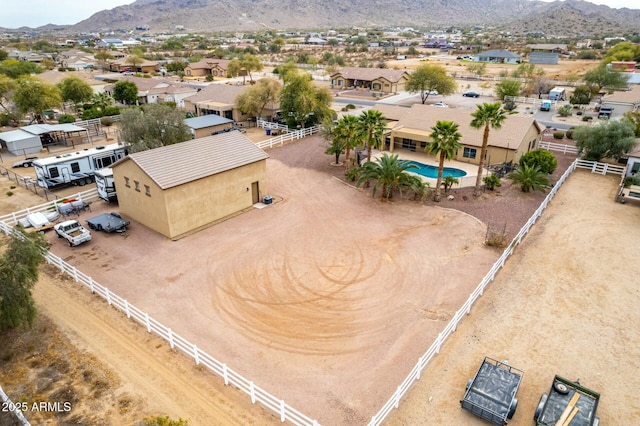 drone / aerial view featuring a mountain view