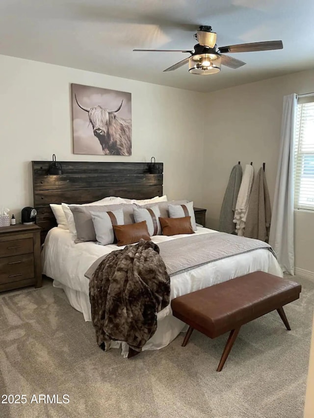 2465 W Clement Cir, Flagstaff, AZ 86001 - bedroom with light colored carpet and a ceiling fan