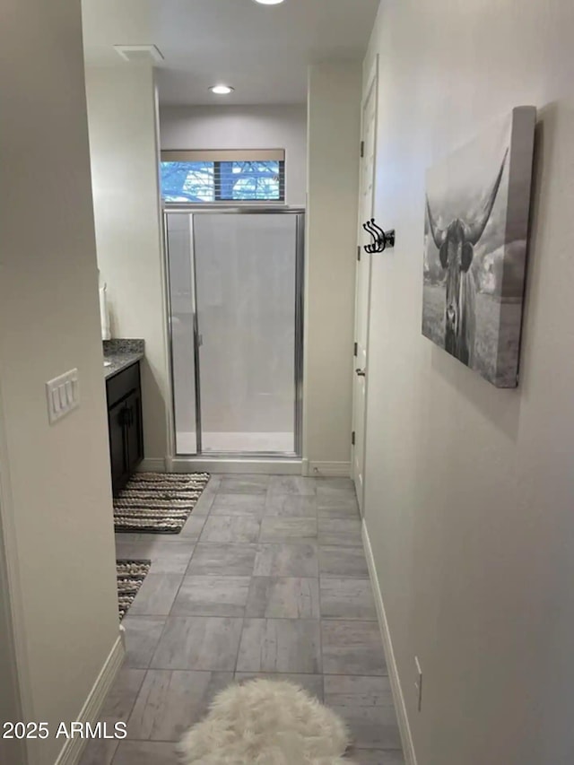 2465 W Clement Cir, Flagstaff, AZ 86001 - full bathroom with a stall shower, vanity, baseboards, and recessed lighting