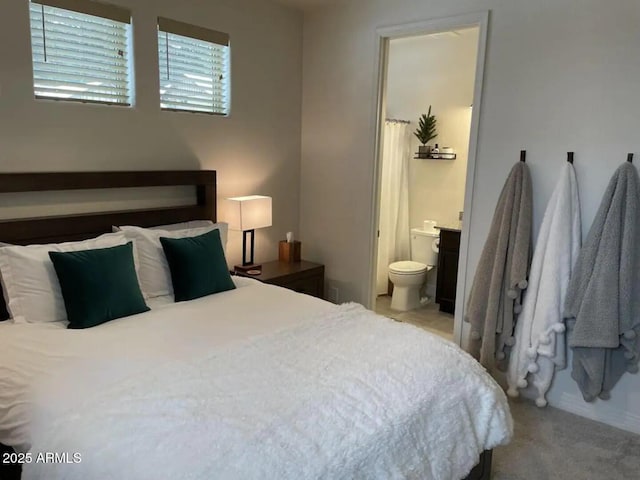 2465 W Clement Cir, Flagstaff, AZ 86001 - bedroom featuring light carpet and ensuite bathroom