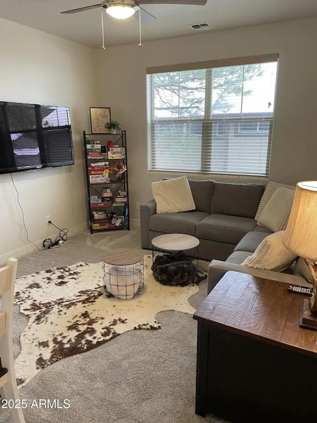 2465 W Clement Cir, Flagstaff, AZ 86001 - carpeted living room with plenty of natural light, ceiling fan, and baseboards