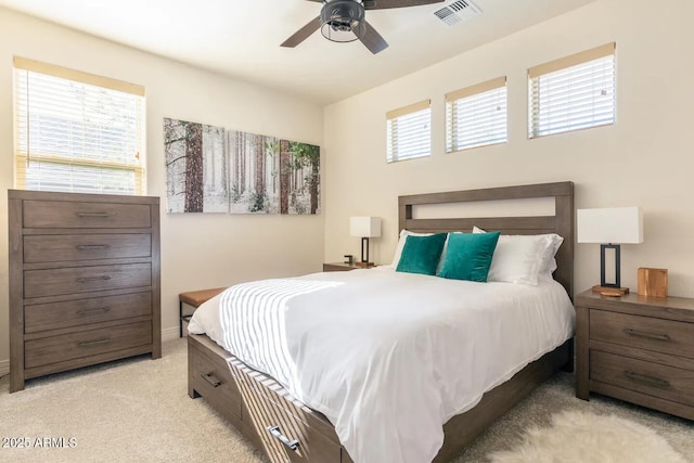 2465 W Clement Cir, Flagstaff, AZ 86001 - bedroom with light carpet, baseboards, and ceiling fan