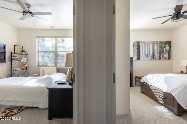 2465 W Clement Cir, Flagstaff, AZ 86001 - bedroom featuring light carpet, ceiling fan, and baseboards