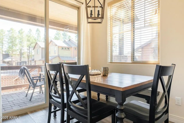 2465 W Clement Cir, Flagstaff, AZ 86001 - dining room with plenty of natural light and baseboards