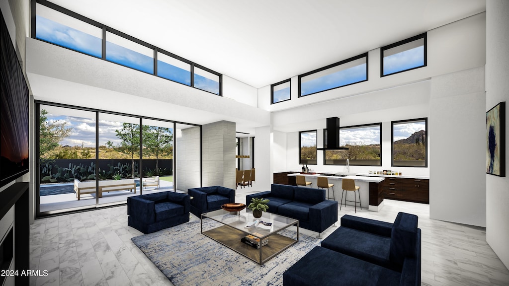 living room with a high ceiling