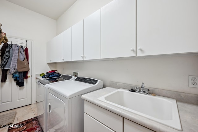 4414 W Monte Way, Laveen, AZ 85339 - washroom with washing machine and clothes dryer, cabinet space, and light tile patterned floors