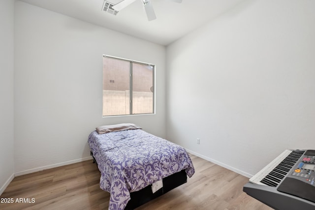 4414 W Monte Way, Laveen, AZ 85339 - bedroom featuring wood finished floors, baseboards, and ceiling fan