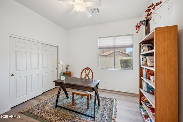 4414 W Monte Way, Laveen, AZ 85339 - office area with wood finished floors, a ceiling fan, and baseboards
