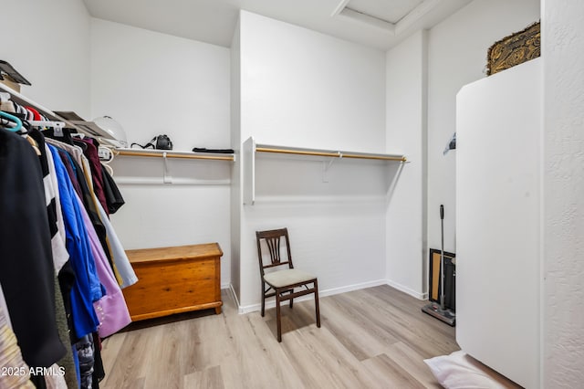 4414 W Monte Way, Laveen, AZ 85339 - spacious closet with attic access and wood finished floors