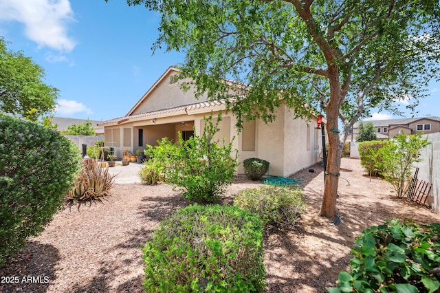4414 W Monte Way, Laveen, AZ 85339 - rear view of property with stucco siding, a fenced backyard, and a patio