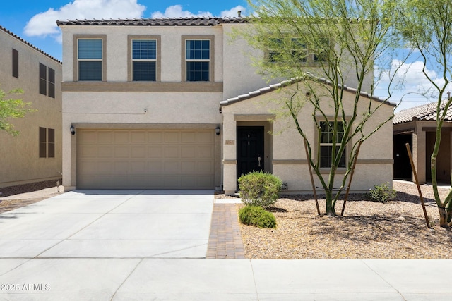 12531 W Glenn Dr, Glendale, AZ 85307 - view of front of property featuring stucco siding, an attached garage, driveway, and a tile roof