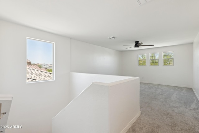 12531 W Glenn Dr, Glendale, AZ 85307 - hall featuring an upstairs landing, light colored carpet, and baseboards