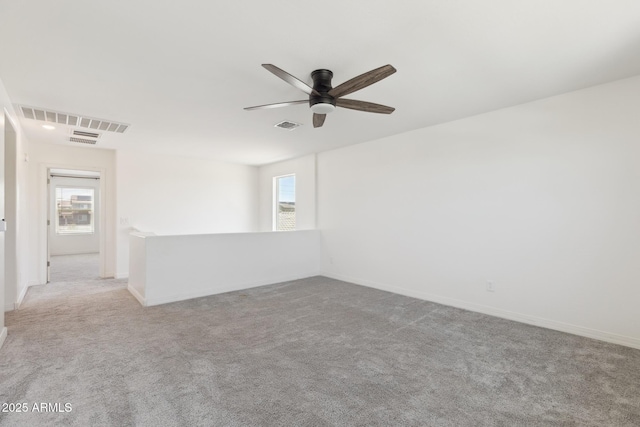 12531 W Glenn Dr, Glendale, AZ 85307 - carpeted spare room featuring plenty of natural light, ceiling fan, and baseboards