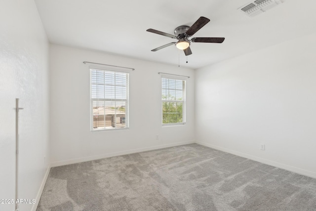 12531 W Glenn Dr, Glendale, AZ 85307 - spare room with carpet, a ceiling fan, and baseboards