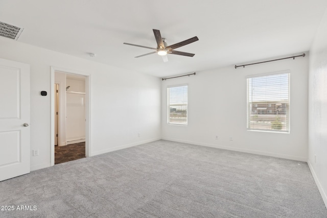 12531 W Glenn Dr, Glendale, AZ 85307 - unfurnished bedroom with carpet, baseboards, and ceiling fan