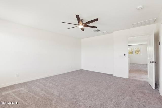 12531 W Glenn Dr, Glendale, AZ 85307 - spare room with a ceiling fan, carpet floors, a smoke detector, and baseboards