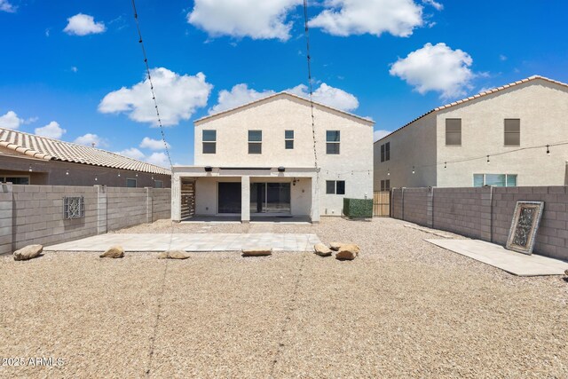 12531 W Glenn Dr, Glendale, AZ 85307 - rear view of property with a patio, a fenced backyard, and stucco siding