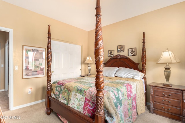 bedroom featuring light colored carpet