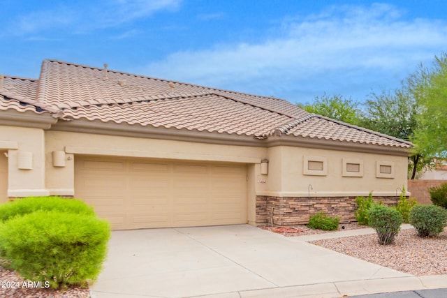 view of front of home featuring a garage