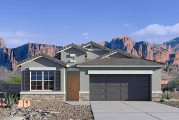 view of front of property with stone siding, concrete driveway, a garage, and a mountain view