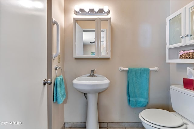 bathroom featuring toilet