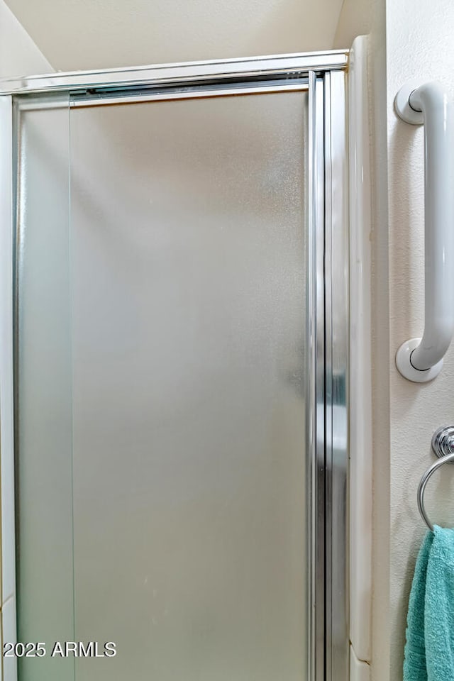 bathroom featuring a stall shower