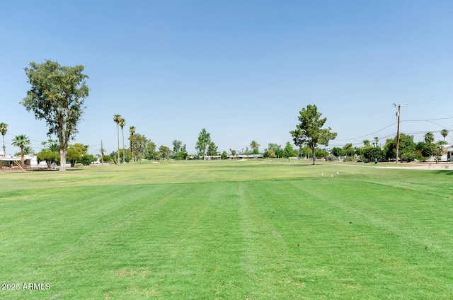 view of home's community with a lawn