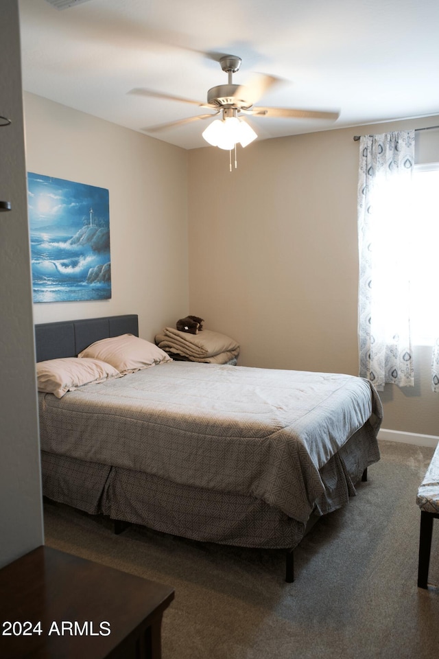 bedroom with carpet and ceiling fan