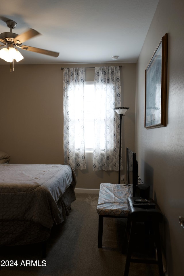 bedroom with ceiling fan, carpet floors, and pool table