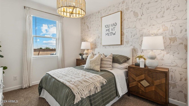 11890 E Cliffrose Ln, Florence, AZ 85132 - bedroom with a chandelier, baseboards, carpet flooring, and wallpapered walls