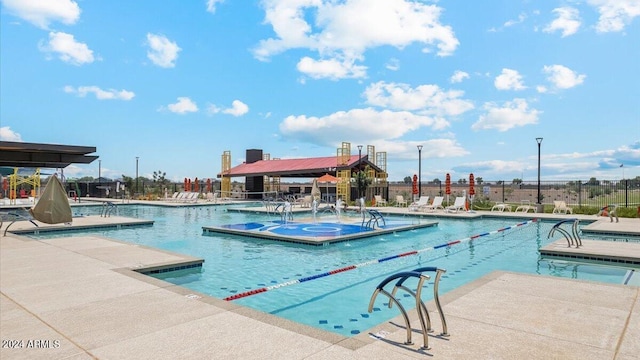11890 E Cliffrose Ln, Florence, AZ 85132 - community pool with a patio area