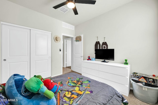 bedroom featuring visible vents, a closet, and ceiling fan