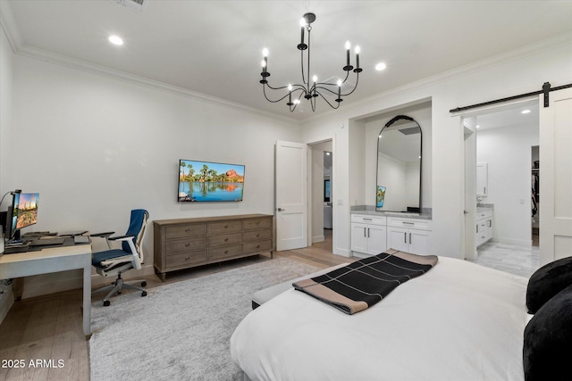 3808 E Fairmount Ave, Phoenix, AZ 85018 - bedroom featuring a barn door, ornamental molding, light wood-style flooring, an office area, and a chandelier